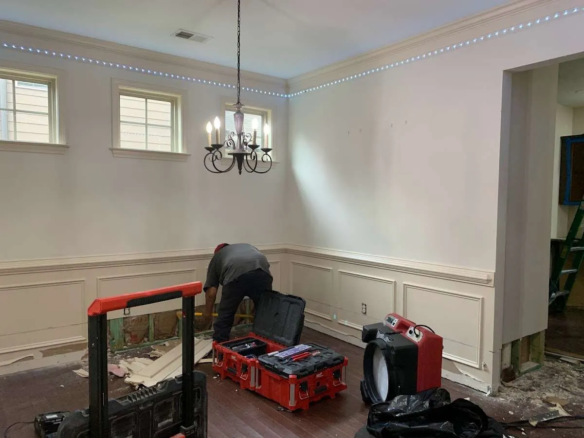 Restoration technician with professional equipment in Carrboro